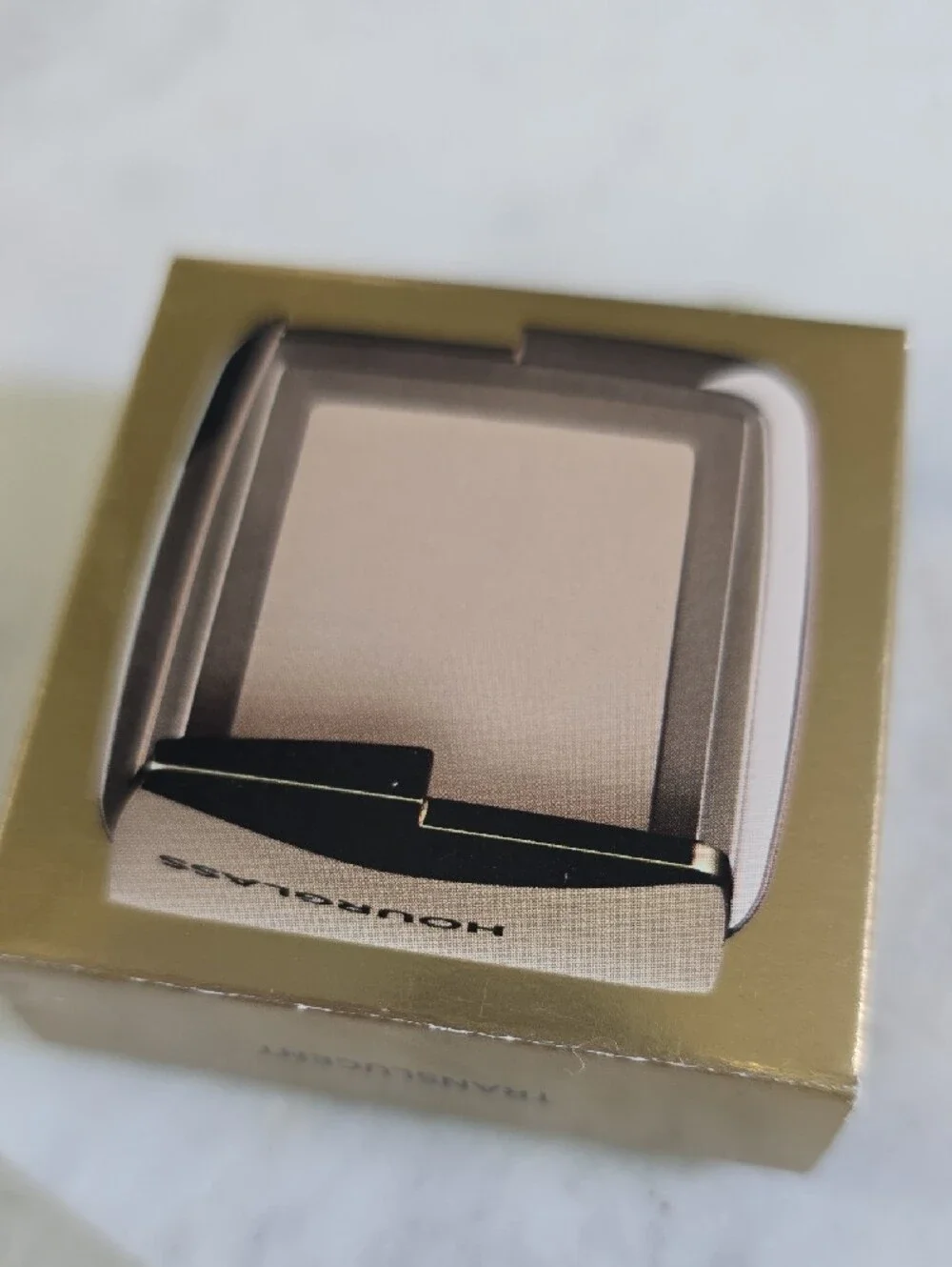 Hourglass compact pressed
